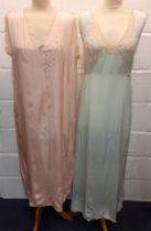 A group of mid 20th Century silk night gowns in various colours and designs, together with a later