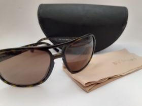 Bvlgari-A pair of brown sunglasses with brown lenses (one slightly scratched), model no: BV7008