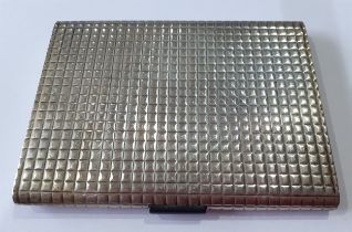 An Art Deco Century silver cigarette case having a square chequered design front and back, makers