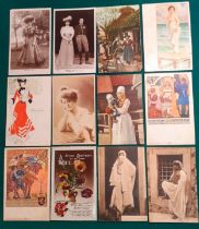 A small collection of 26 vintage postcards to include fashion related examples, a 1909 postcard of a