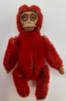 Schuco- A 1920's compact in the form of a small mohair jointed monkey, 8.5cm high. Location:Cab