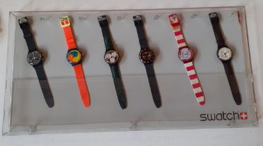 Swatch- A 1993 Jelly Stag Neon chronograph watch on orange strap together with 5 other Swatch