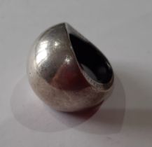 Hermes-A Contemporary silver ring of bulbous form having a black composition lining, stamped with