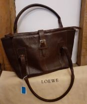 Loewe-A dark brown 'Senda' handbag, 40cm Wide x 22cm High, having 2 rolled leather handles, silver