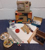 Vintage sewing and knitting related items to include needles, buttons and a Vulcan Countess child'
