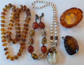 Amber and amber effect costume jewellery to include a vintage brown amber necklace with faceted