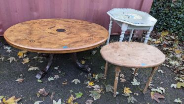 A Victorian and later walnut oval topped table together with a painted octagonal topped table and an