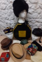 A group of hats to include a 1960's Russian black rabbit fur hat, 2 modern Trilby hats and an