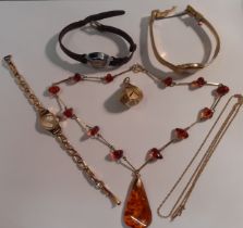 A small quantity of costume jewellery and ladies cocktail watches to include a 14ct gold chain