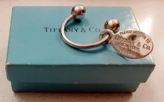 Tiffany & Co-A silver 'Return to Tiffany' keyring, No:553958 in the horseshoe style with ball ends