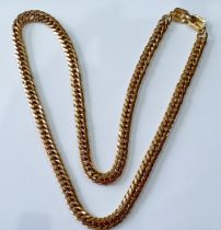 Givenchy-A late 20th Century heavy gold tone chain necklace, 78cm long, with designer's name to