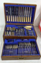 A canteen of silver plated Kings pattern style cutlery and flatware for twelve in an oak case