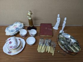 A mixed lot to include two Spode porcelain figurines, a Spanish silver spoon and mixed silver plated