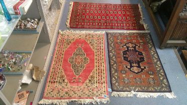 Three small rugs to include a Bokhara with gulls on a red ground and two Turkish rugs Location: