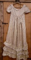 A bespoke cream damask Regency style ballgown, 30" chest x 28" waist x 54" long, with machine made
