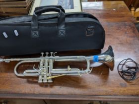 A Yamaha silver tone trumpet with mouthpiece, case and accessories Location: