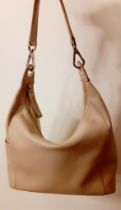 Longchamp-A cream textured leather handbag, 30cm wide x 21cm high (middle) x 35cm high (sides)