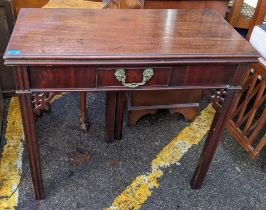 A Georgian mahogany fold over tea table having a single drawer and chamfered legs, 73.5cm h x 83cm w
