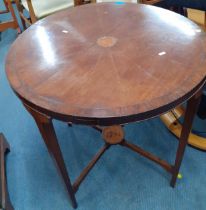 An early 20th century circular cross banded table Location: RAM