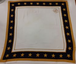 Ralph Lauren- A silk scarf having a cream background with subtle anchor design, wide navy border