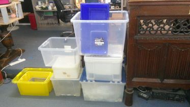 A quantity of plastic storage boxes. Location:Rostrum