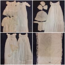 Early 20th Century children's clothing to include white cotton christening dresses, a cream silk