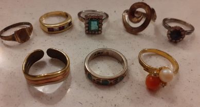 A group of 8 modern dress rings to include a silver gilt ladies signet ring and a yellow metal