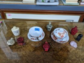 An Oriental lot to include Japanese eggshell rice bowls, stands and a cover, one with iron red six-