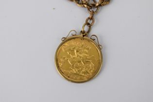 A 9ct gold early 20th century watch chain having T bar and dog clip, along with a mounted 1909