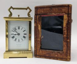 An early 20th century brass cased repeater carriage clock, the white enamel dial having Roman