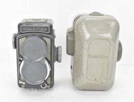 A grey baby Rolleiflex 4 x 4 TLR Camera 1957-63, nr. 2052485, with Schneider-Kreuznach Xenar 1:3,5/
