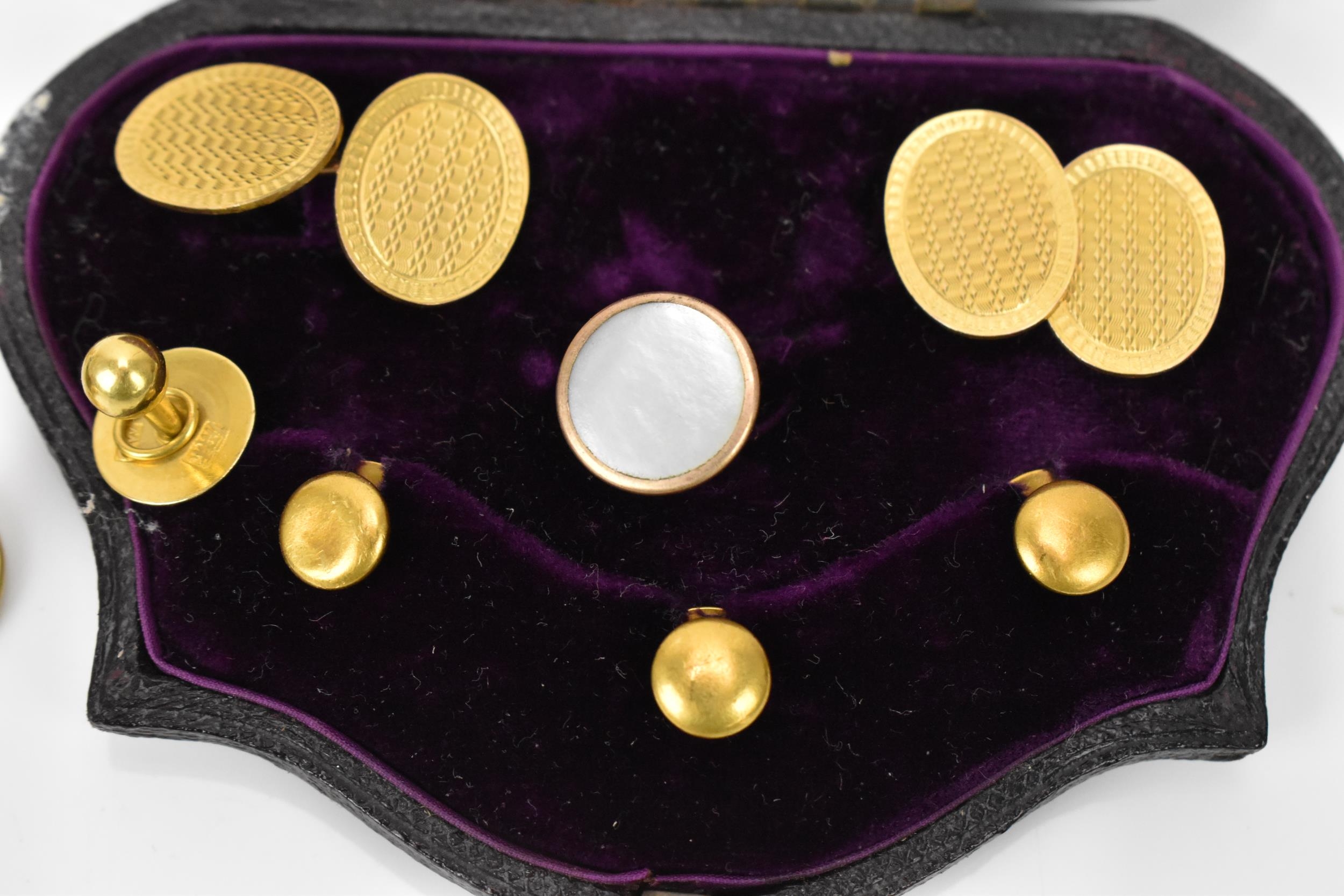 A pair of early 20th century 9ct yellow gold cuff links, together with a boxed set of 18ct dress - Image 3 of 4