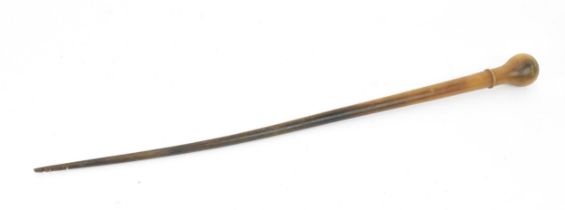 A 19th century rhino horn swagger stick, of tapered form with knopped end, 49 cm long