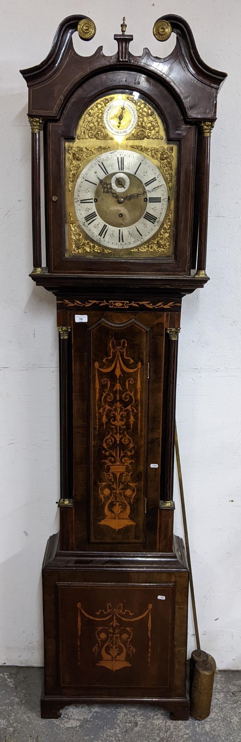 A George III mahogany musical longcase clock, the case having a broken swan neck pediment, marquetry