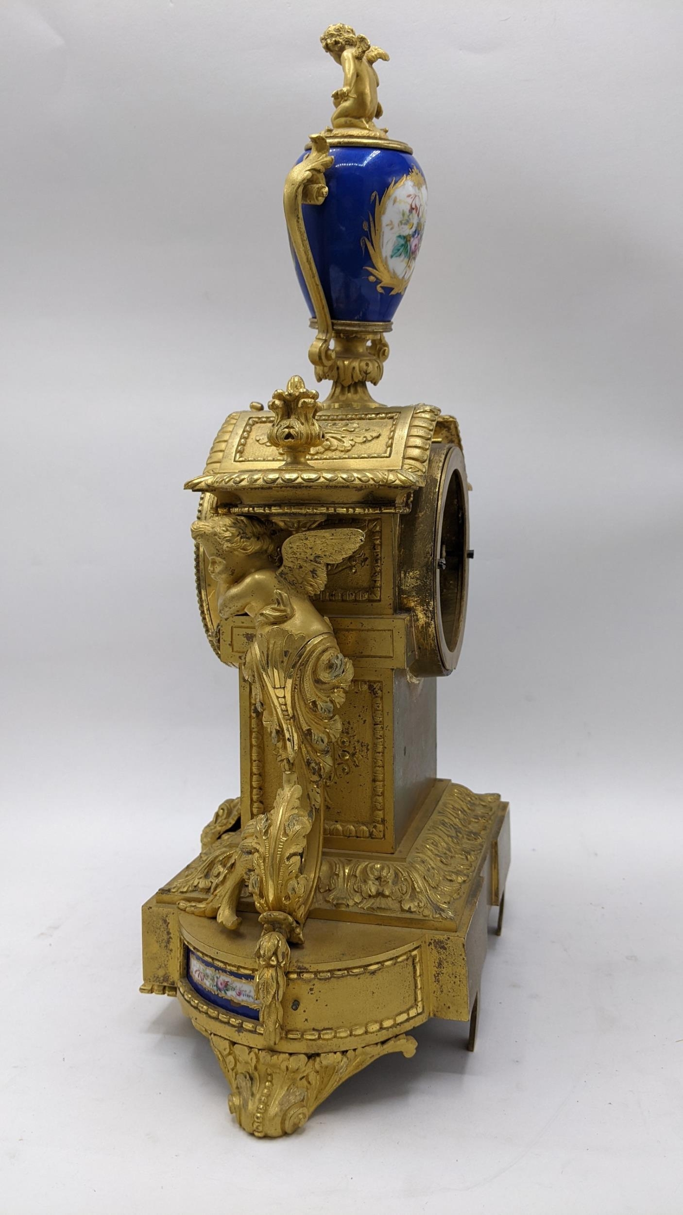 A 19th century French gilt bronze mantle clock, the case having Sevres style porcelain panels, urn - Image 2 of 5