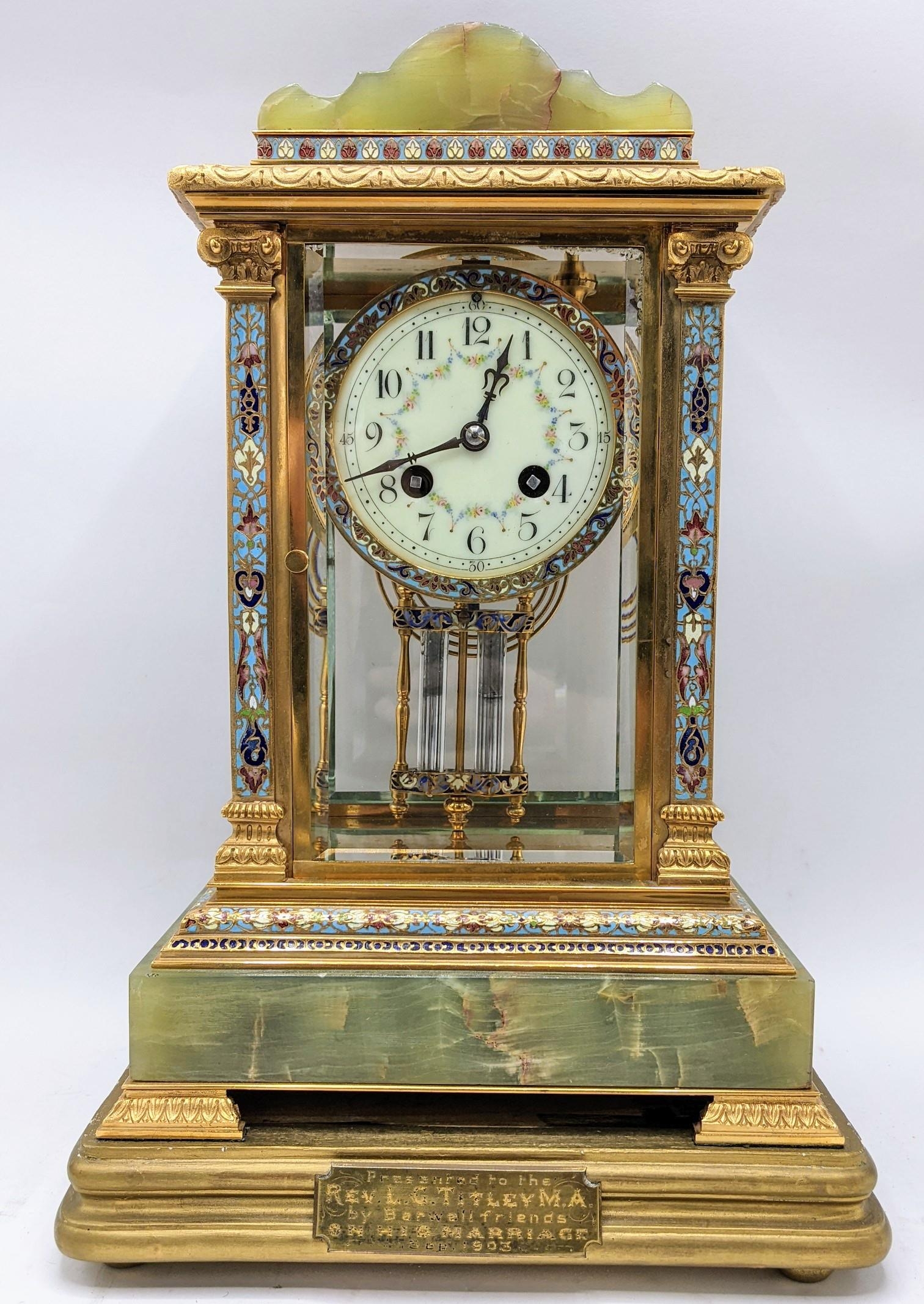 A late 19th/early 20th century four glass onyx and cloisonne mantle clock, the case having