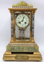 A late 19th/early 20th century four glass onyx and cloisonne mantle clock, the case having