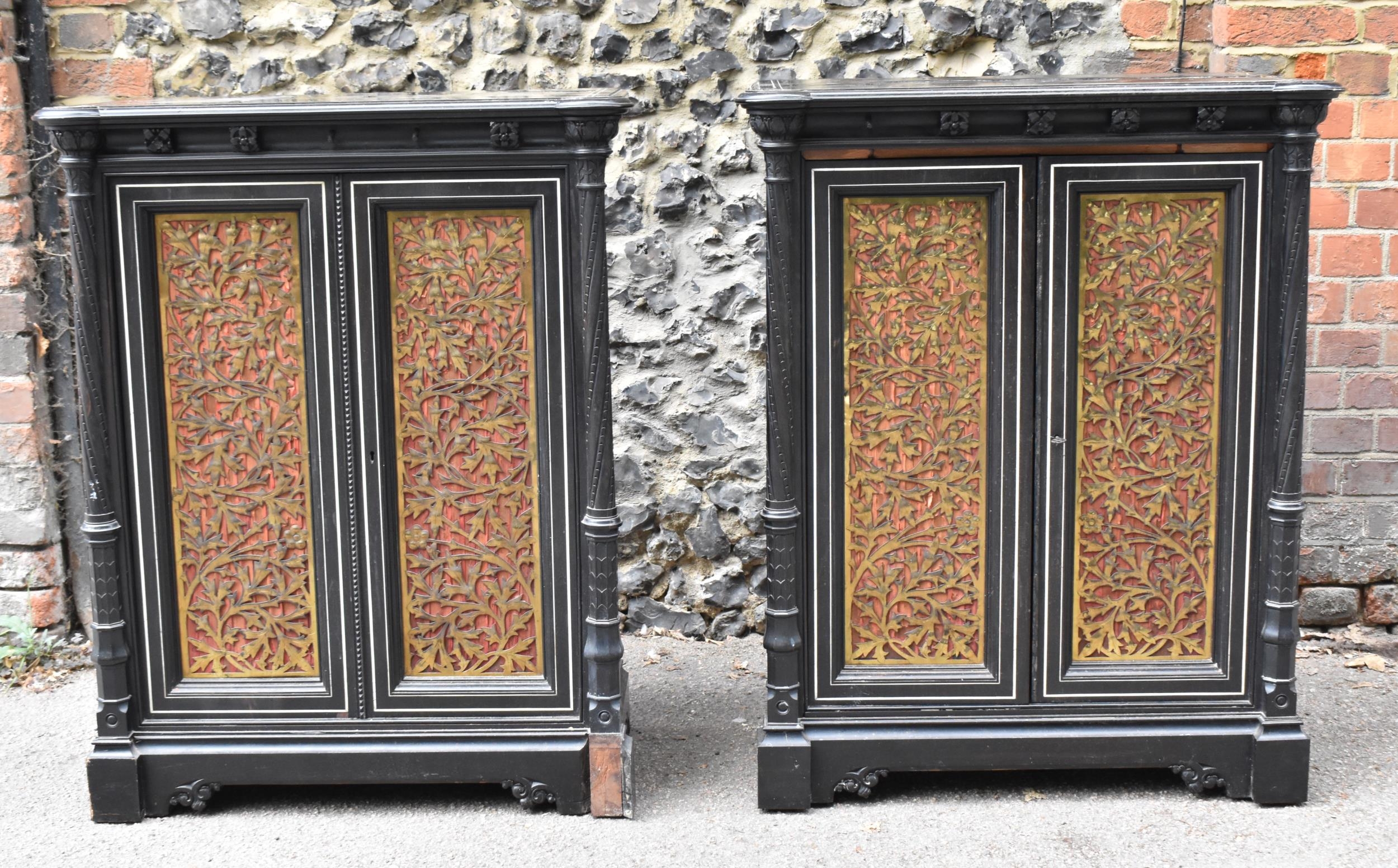 A pair of 19th century Ceylon ebonised, ivory and brass inlaid side cabinets, the rectangular top