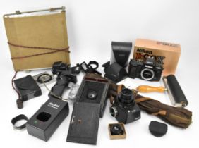 A selection of Rollei camera equipment, to include a Rollei SL66 metered chimney / loupe finder, a