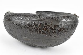 A carved Persian coco de mer Kashkul/begging bowl, 19th century, decorated with Shah Tahmasp and