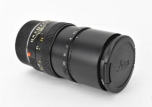 A Leica Elmarit-M 1:2.8/90 E46 lens, in black, Nr. 3857217, with lens cap