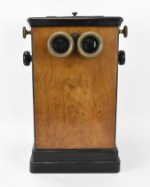 A Victorian walnut and ebonised wood table-top stereoscope viewer, with cranking mechanism, with