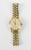 A Longines, automatic, gents, 18ct gold wristwatch, having a silvered dial, centre seconds, gilt