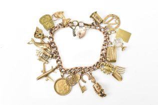 A 9ct rose gold charm bracelet, with a Victorian 1900 half sovereign coin, and various hanging