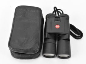 A pair of Leica Trinovid 10x25 binoculars, in leather carry case