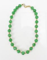 A green jade same-sized bead and 9ct gold necklace, with 26 approx. 12mm diameter round jade