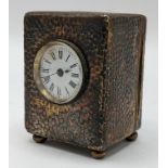 An Edwardian Asprey silver dressing table clock, the case having hammered decoration, initialled '