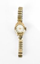 A Tudor, manual wind, ladies, 9ct gold vintage wristwatch, the white dial having Tudor rose logo and