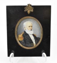 A Victorian portrait miniature on ivory of Captain Welman, circa 1860, within a black painted