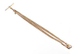 A 9ct gold curb link pocket watch chain having two dog clip clasps and a T-bar, 37cm long, 30.9